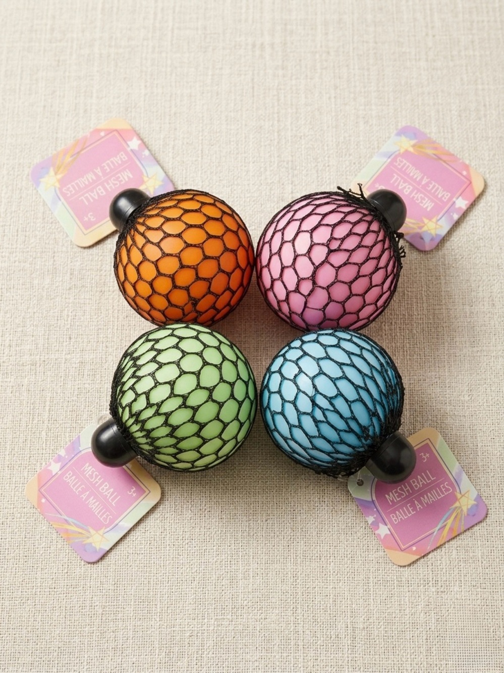 Set of 4 Sensory Mesh Squish Balls – Fun Fidget Toys for Stress Relief